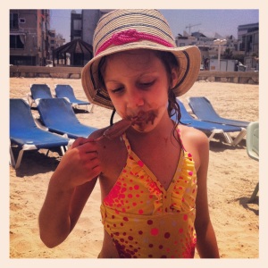 Elizabeth enjoying ice cream at the beach. 